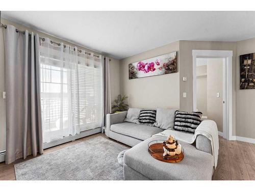 3407-11 Mahogany Row Se, Calgary, AB - Indoor Photo Showing Living Room