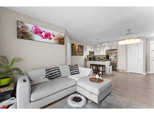 3407-11 Mahogany Row Se, Calgary, AB - Indoor Photo Showing Living Room