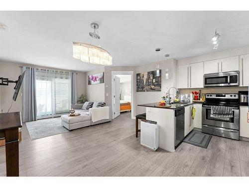 3407-11 Mahogany Row Se, Calgary, AB - Indoor Photo Showing Kitchen With Stainless Steel Kitchen