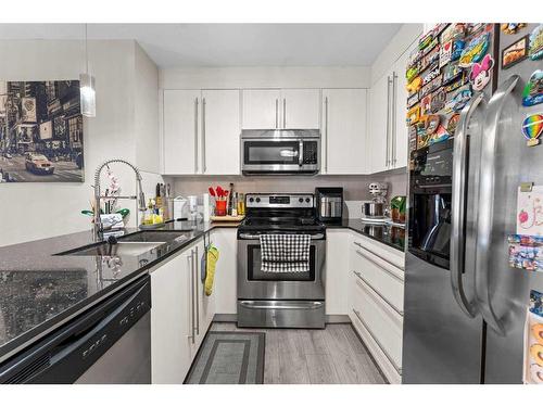 3407-11 Mahogany Row Se, Calgary, AB - Indoor Photo Showing Kitchen With Stainless Steel Kitchen