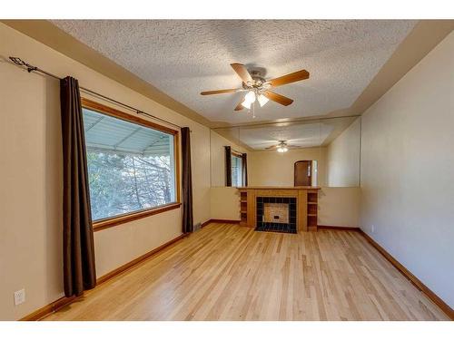 1208 Bellevue Avenue Se, Calgary, AB - Indoor With Fireplace