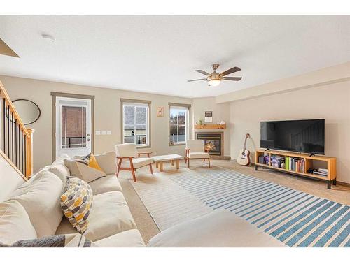 204-52 Mcrae Street, Okotoks, AB - Indoor Photo Showing Living Room