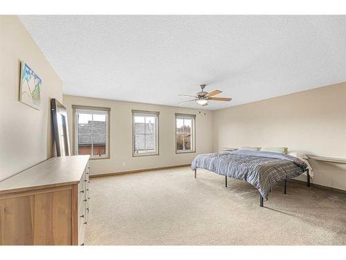 204-52 Mcrae Street, Okotoks, AB - Indoor Photo Showing Bedroom