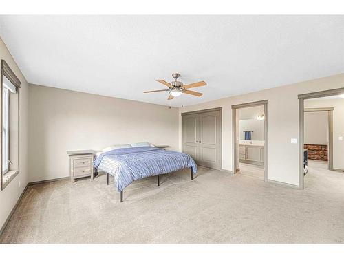 204-52 Mcrae Street, Okotoks, AB - Indoor Photo Showing Bedroom