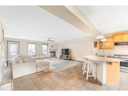 204-52 Mcrae Street, Okotoks, AB - Indoor Photo Showing Kitchen