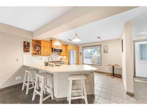 204-52 Mcrae Street, Okotoks, AB - Indoor Photo Showing Kitchen