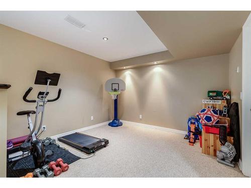 152 Copperstone Gardens Se, Calgary, AB - Indoor Photo Showing Gym Room