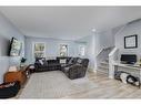 152 Copperstone Gardens Se, Calgary, AB  - Indoor Photo Showing Living Room 