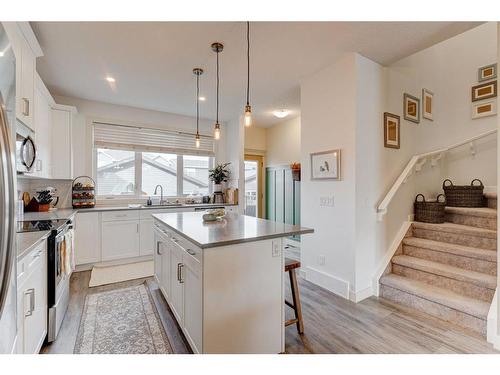 112 Fireside Crescent, Cochrane, AB - Indoor Photo Showing Kitchen With Upgraded Kitchen