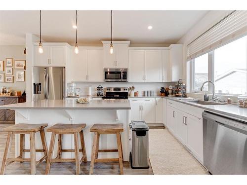 112 Fireside Crescent, Cochrane, AB - Indoor Photo Showing Kitchen With Stainless Steel Kitchen With Upgraded Kitchen