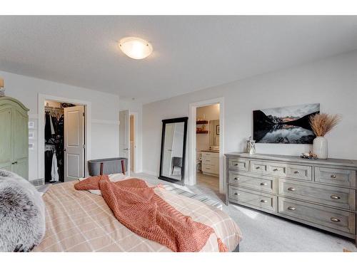 112 Fireside Crescent, Cochrane, AB - Indoor Photo Showing Bedroom