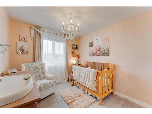 112 Fireside Crescent, Cochrane, AB - Indoor Photo Showing Bedroom