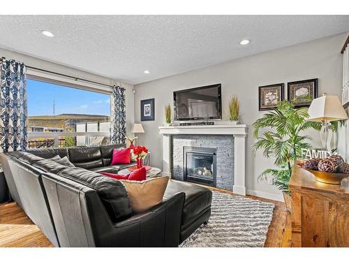 86 Nolancliff Crescent Nw, Calgary, AB - Indoor Photo Showing Living Room With Fireplace