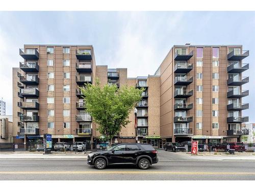 220-519 17 Avenue Sw, Calgary, AB - Outdoor With Balcony With Facade