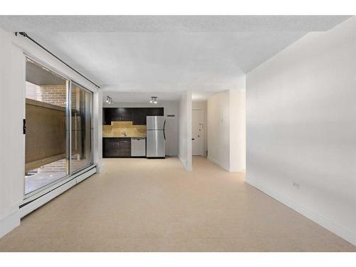 220-519 17 Avenue Sw, Calgary, AB - Indoor Photo Showing Other Room