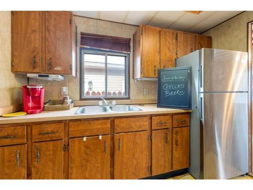 260 Spring Haven Court South, Airdrie, AB - Indoor Photo Showing Kitchen With Double Sink