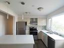 932 43 Street Sw, Calgary, AB  - Indoor Photo Showing Kitchen With Double Sink With Upgraded Kitchen 