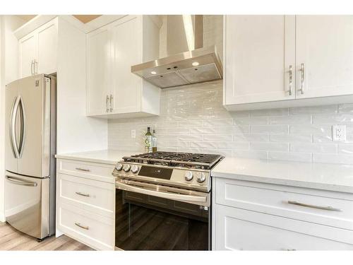 47 Magnolia Way Se, Calgary, AB - Indoor Photo Showing Kitchen With Stainless Steel Kitchen With Upgraded Kitchen