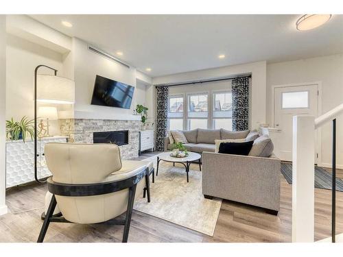 47 Magnolia Way Se, Calgary, AB - Indoor Photo Showing Living Room With Fireplace