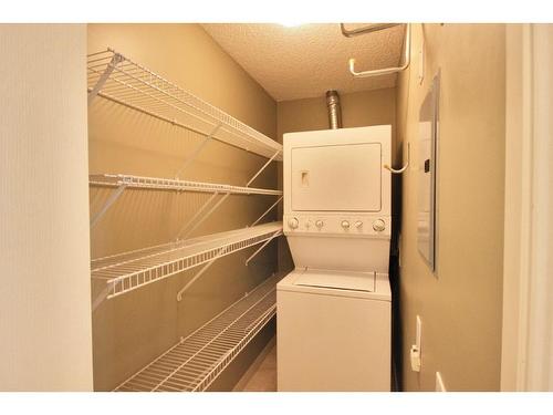 312-5115 Richard Road Sw, Calgary, AB - Indoor Photo Showing Laundry Room