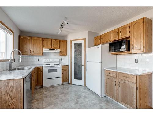 146 Arbour Stone Place Nw, Calgary, AB - Indoor Photo Showing Kitchen