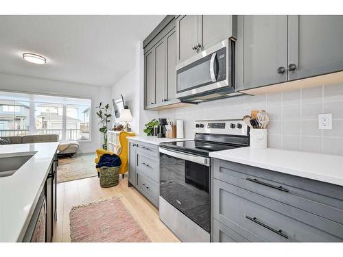 387 Fireside Way, Cochrane, AB - Indoor Photo Showing Kitchen