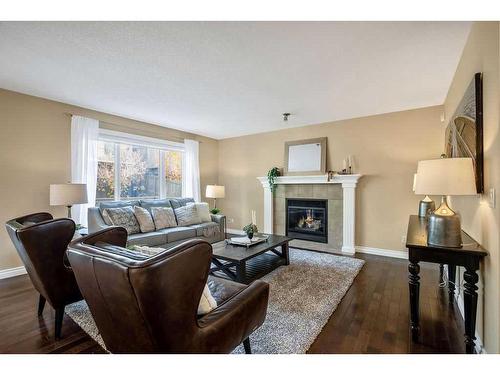 1177 Strathcona Drive Sw, Calgary, AB - Indoor Photo Showing Living Room With Fireplace