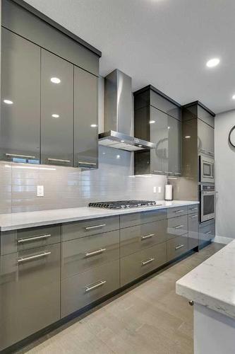 74 Clear Creek Place, Rural Rocky View County, AB - Indoor Photo Showing Kitchen With Upgraded Kitchen