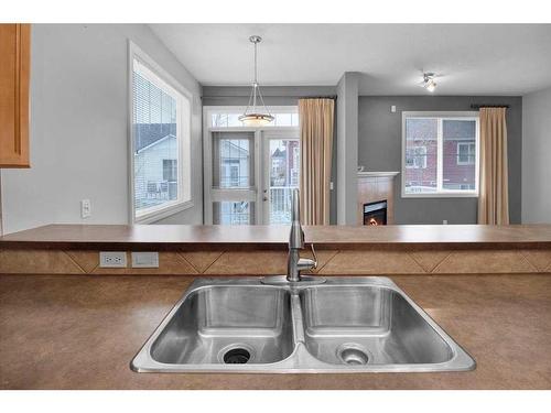 50 Tucker Circle, Okotoks, AB - Indoor Photo Showing Kitchen With Double Sink