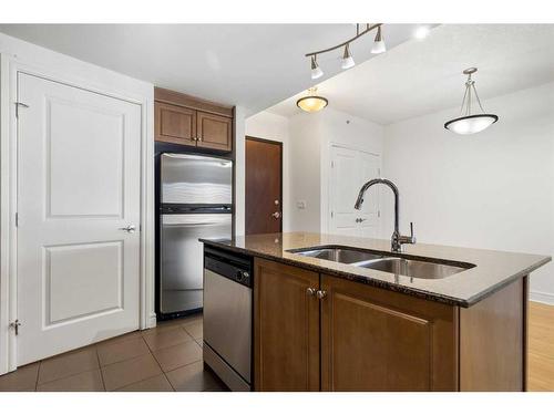 1501-910 5 Avenue Sw, Calgary, AB - Indoor Photo Showing Kitchen With Stainless Steel Kitchen With Double Sink