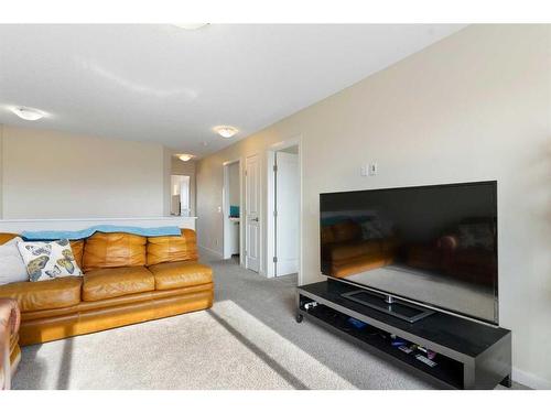 302 River Heights Crescent, Cochrane, AB - Indoor Photo Showing Living Room