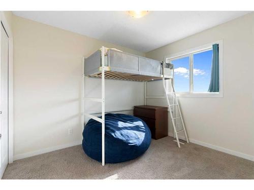 302 River Heights Crescent, Cochrane, AB - Indoor Photo Showing Bedroom