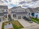 302 River Heights Crescent, Cochrane, AB  - Outdoor With Facade 