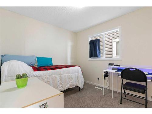 302 River Heights Crescent, Cochrane, AB - Indoor Photo Showing Bedroom