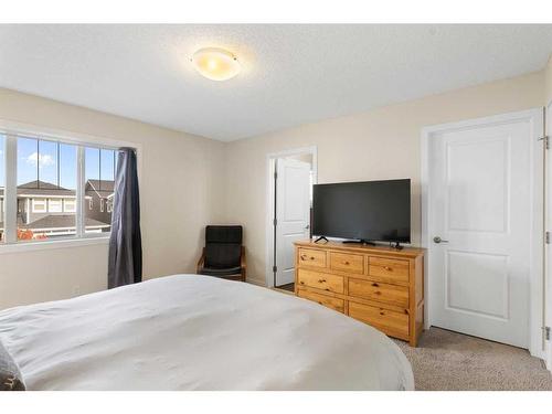 302 River Heights Crescent, Cochrane, AB - Indoor Photo Showing Bedroom