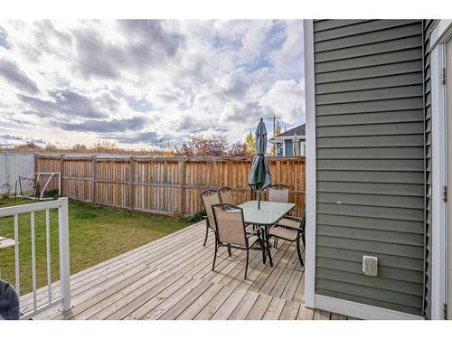 302 River Heights Crescent, Cochrane, AB - Outdoor With Deck Patio Veranda With Exterior