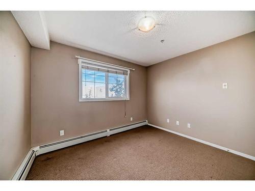 1104-10 Prestwick Bay Se, Calgary, AB - Indoor Photo Showing Other Room