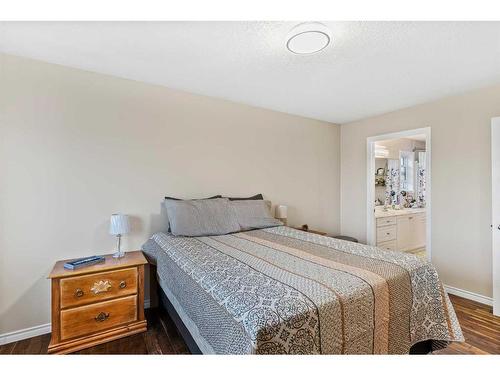 311 Taracove Estate Drive Ne, Calgary, AB - Indoor Photo Showing Bedroom