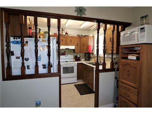 13 Big Springs Drive Se, Airdrie, AB - Indoor Photo Showing Kitchen