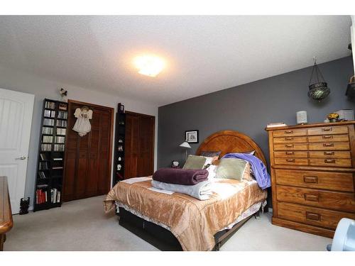 13 Big Springs Drive Se, Airdrie, AB - Indoor Photo Showing Bedroom