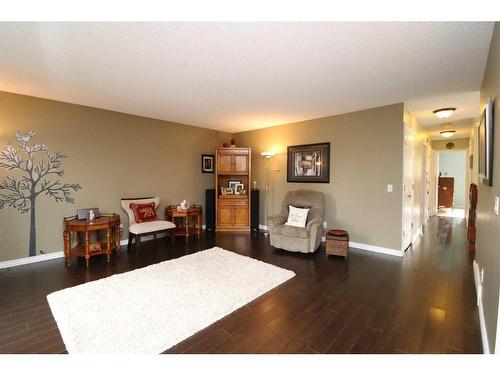 13 Big Springs Drive Se, Airdrie, AB - Indoor Photo Showing Living Room