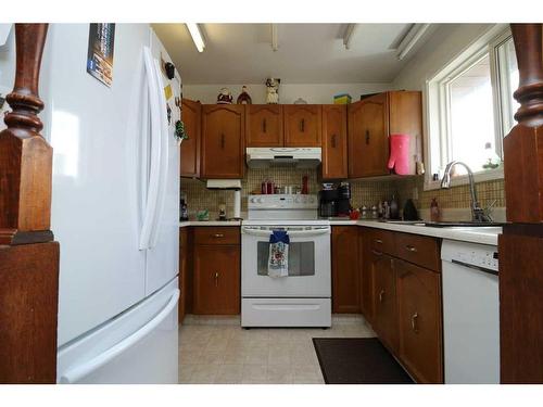 13 Big Springs Drive Se, Airdrie, AB - Indoor Photo Showing Kitchen