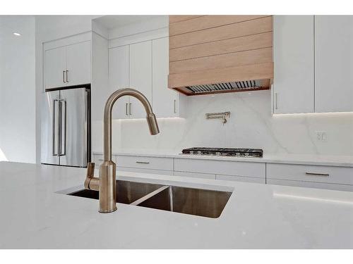 1143 Richland Road Ne, Calgary, AB - Indoor Photo Showing Kitchen With Double Sink