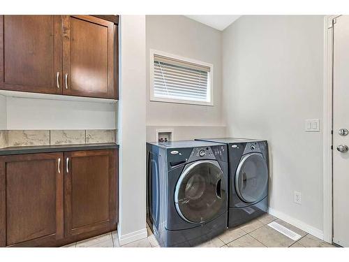 32 Silverado Saddle Court Sw, Calgary, AB - Indoor Photo Showing Laundry Room