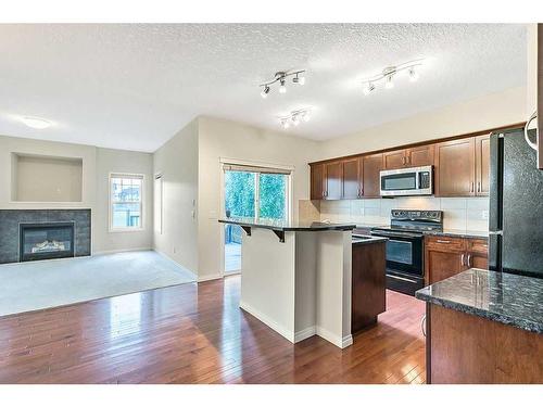 32 Silverado Saddle Court Sw, Calgary, AB - Indoor Photo Showing Kitchen