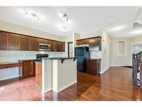 32 Silverado Saddle Court Sw, Calgary, AB - Indoor Photo Showing Kitchen