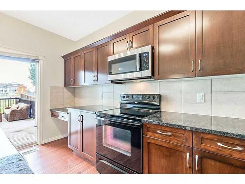 32 Silverado Saddle Court Sw, Calgary, AB - Indoor Photo Showing Kitchen