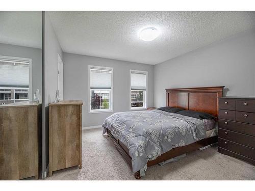 32 Auburn Meadows Avenue Se, Calgary, AB - Indoor Photo Showing Bedroom