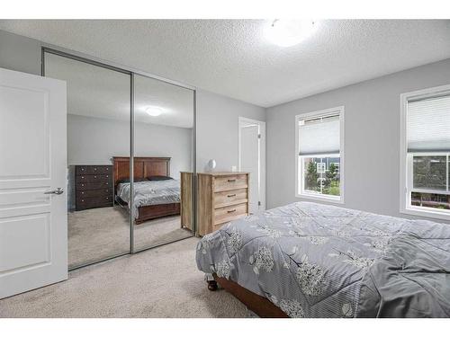 32 Auburn Meadows Avenue Se, Calgary, AB - Indoor Photo Showing Bedroom