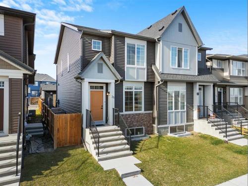 25 Creekside Boulevard Sw, Calgary, AB - Outdoor With Facade